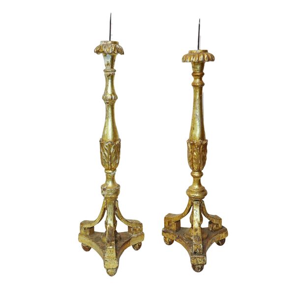 Pair of gilded wooden leaf candlesticks