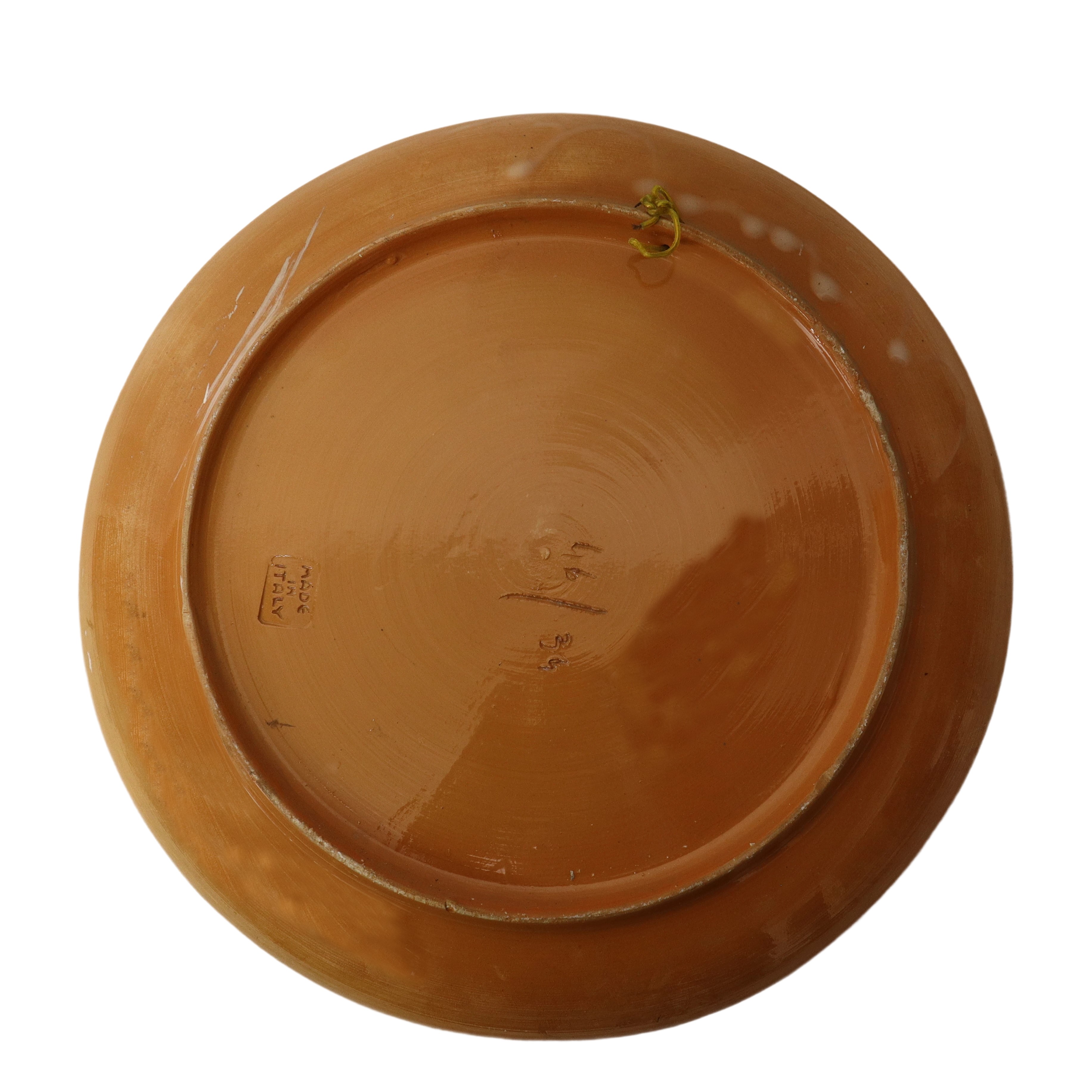 Piatto in ceramica policroma dipinta a motivi floreali e smaltata