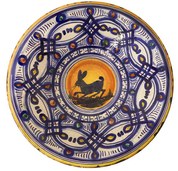 Large decorative ceramic plate with hare depiction
