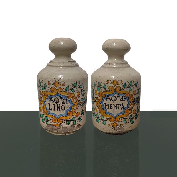 Pair of pharmacy bottles, linseed water and mint water