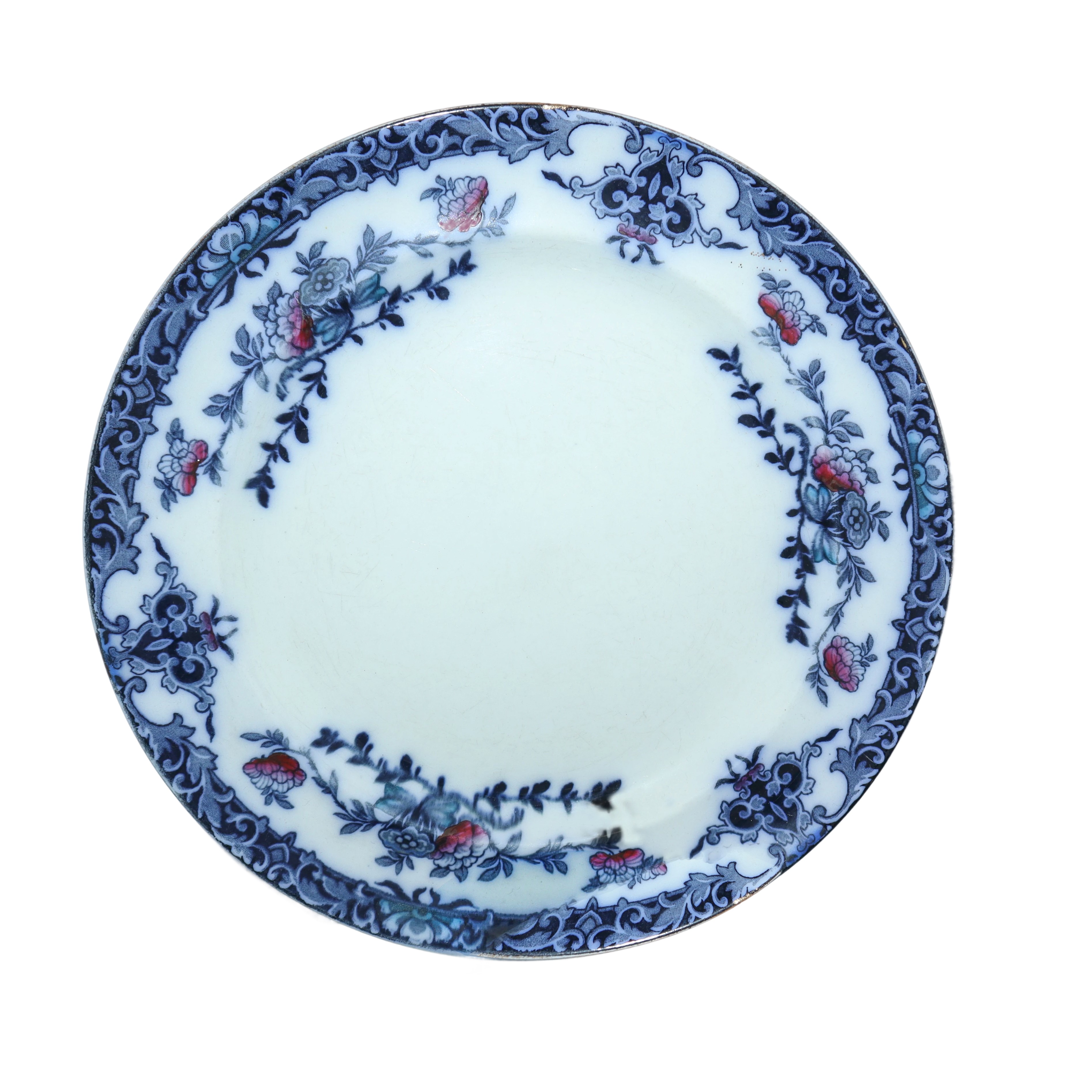 Gruppo di 15 piatti da muro in porcellana con decori floreali nei toni del blu.