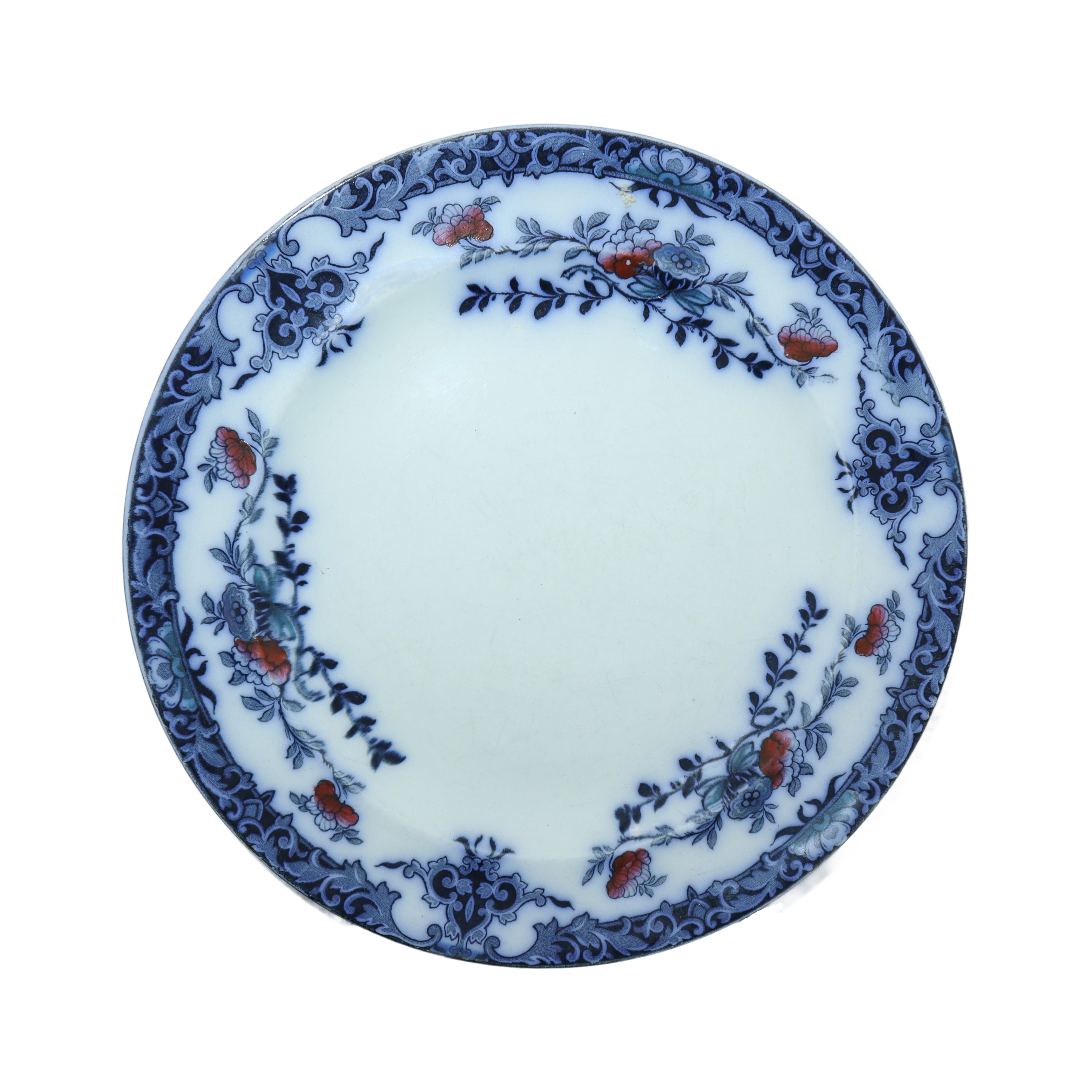 Gruppo di 15 piatti da muro in porcellana con decori floreali nei toni del blu.