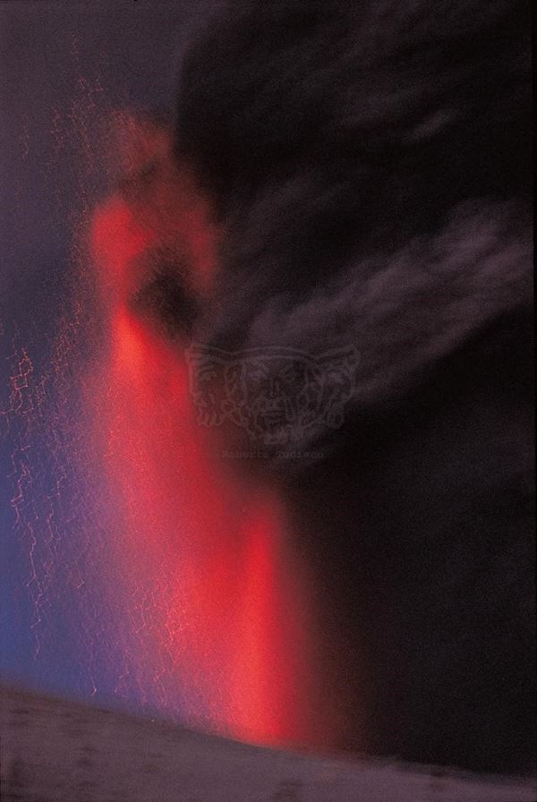 Collection (EM), titled "Angel", 2002. slide, 1/8 30x45, cibachrome slide by direct printing, 40x55 forex 10mm, Contouring white, cardboard, edges volcanic sand coating, Etna eruption in 2002, lava explosion