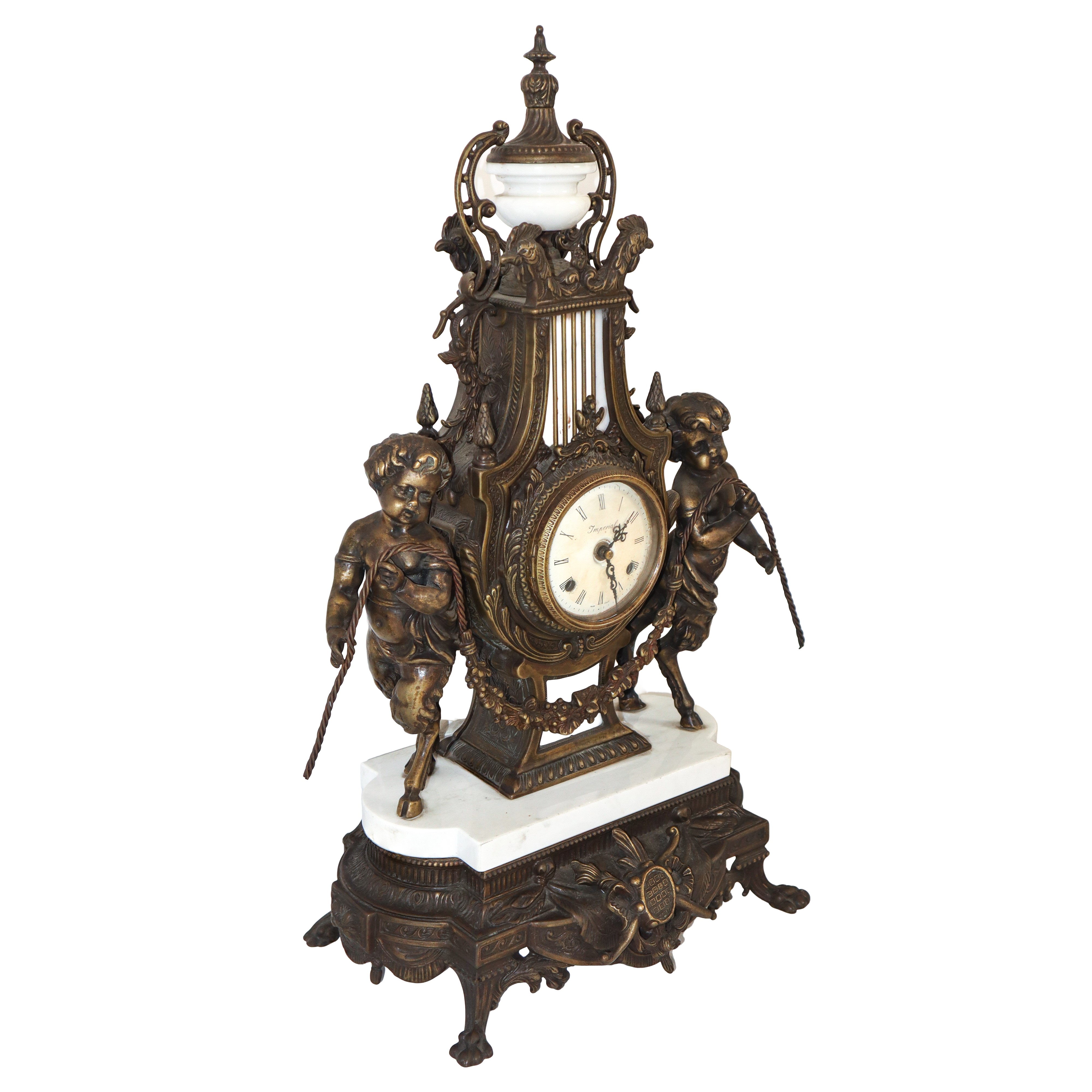 Trittico in bronzo patinato oro e marmo con orologio e candelieri Napoleone III, XIX secolo