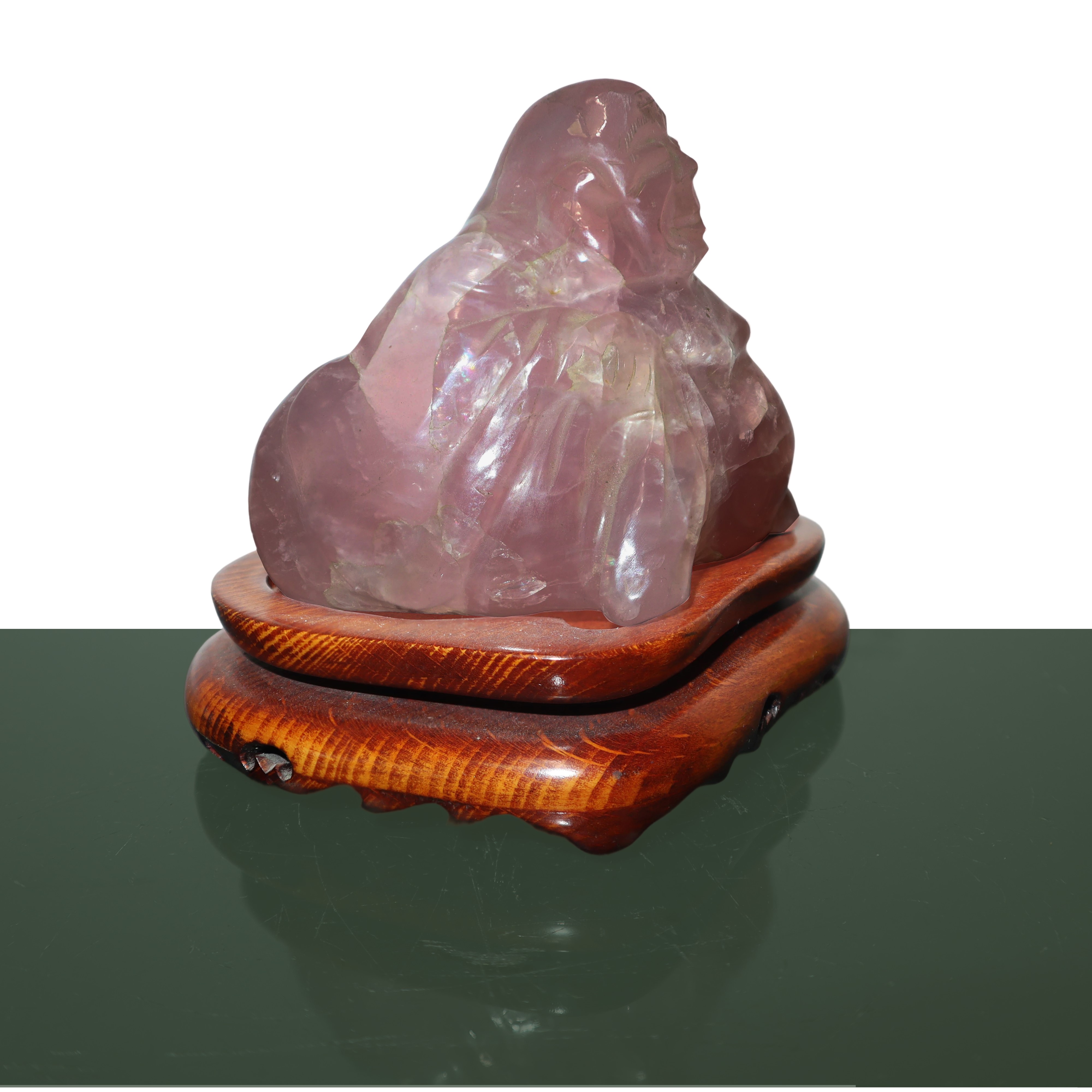 Buddha in quarzo rosa con base in legno