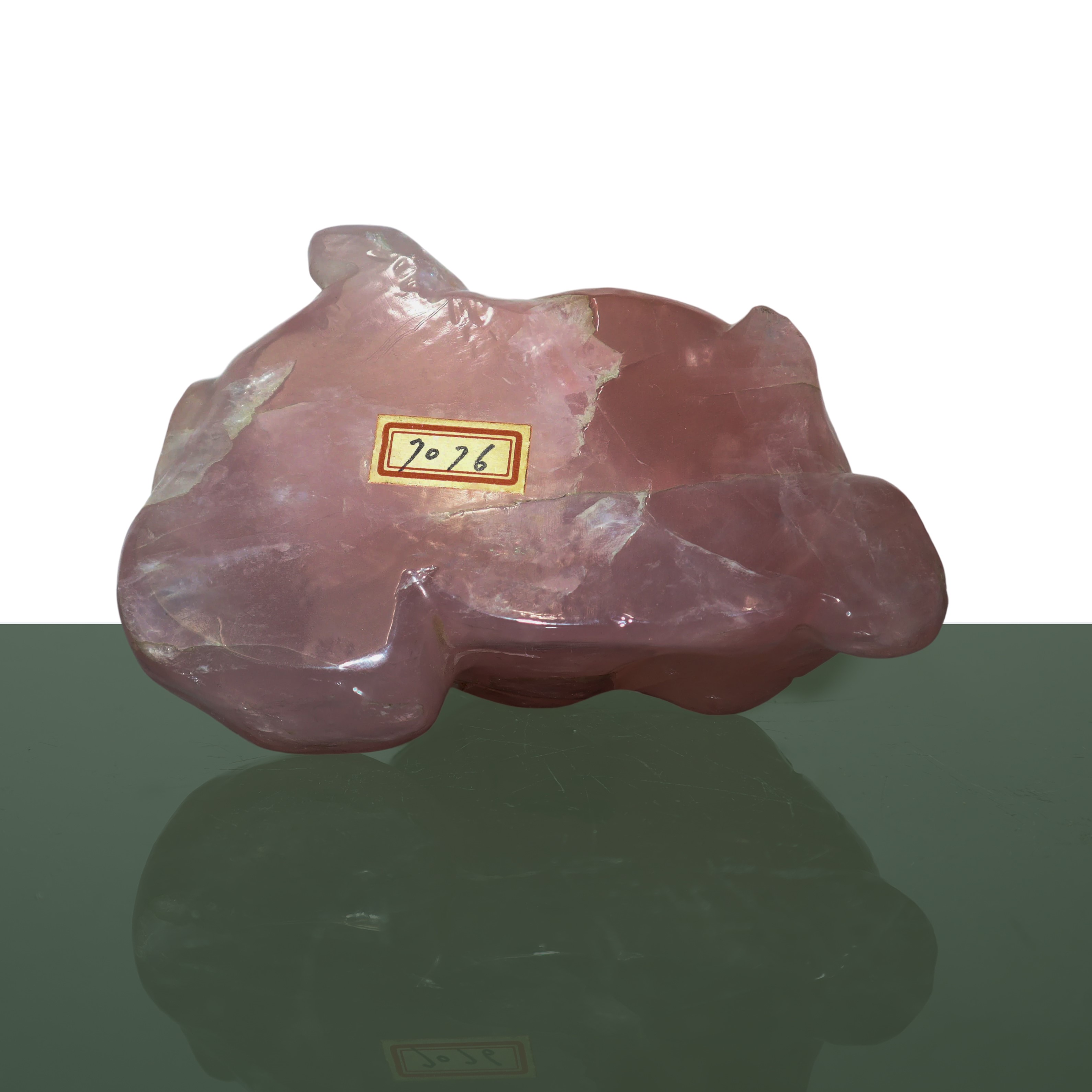 Buddha in quarzo rosa con base in legno