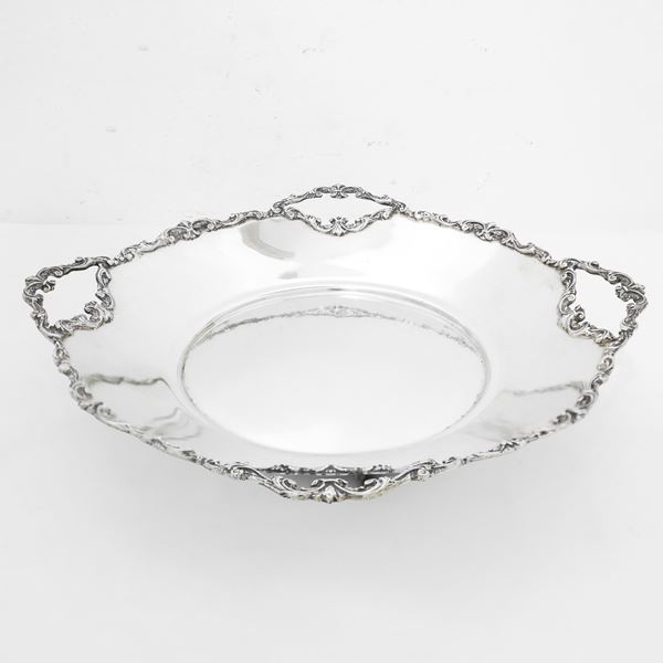 Round stand in 800 silver with edge with four handles
