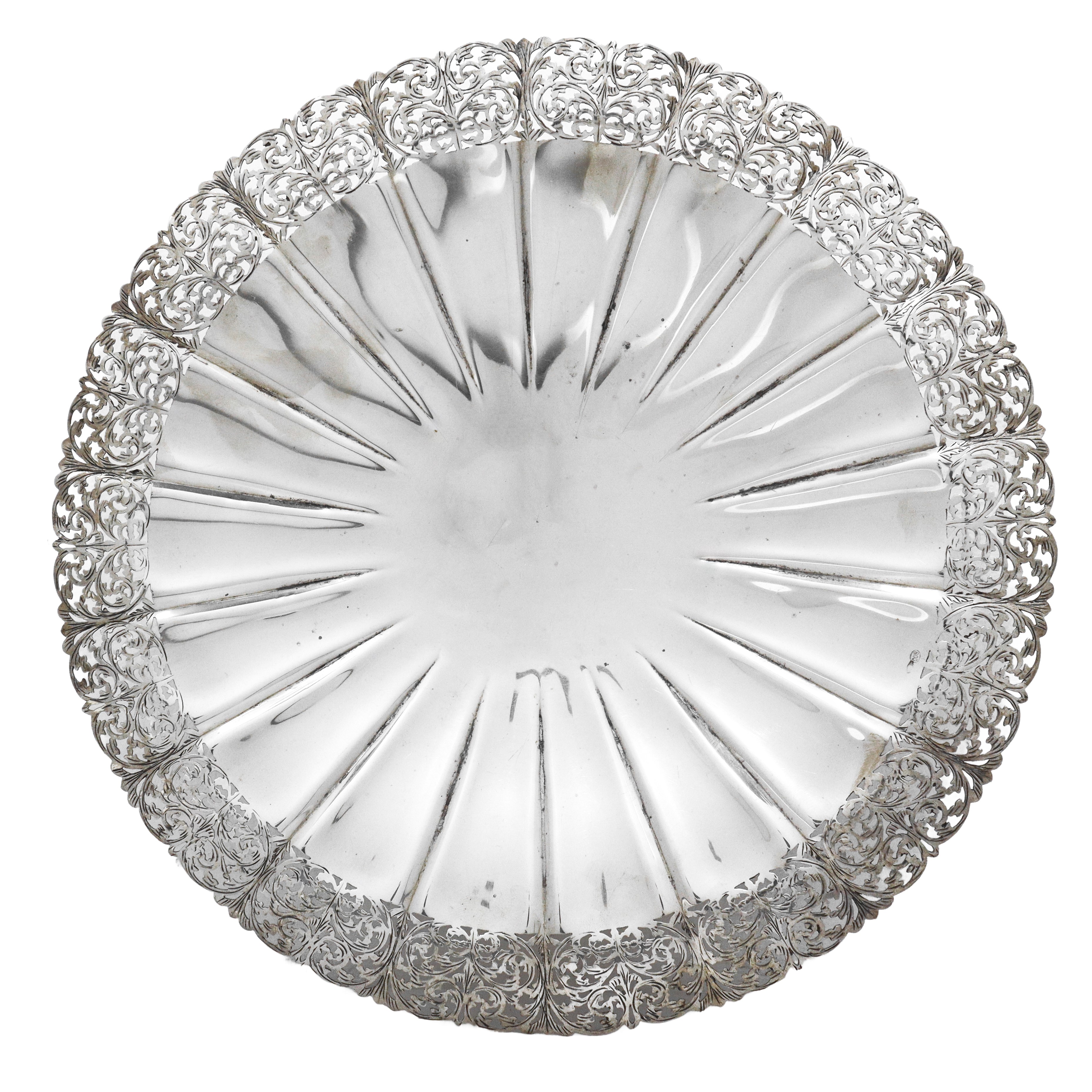 Portabottiglie e alzata rotondi in argento 800 con bordo filigranato