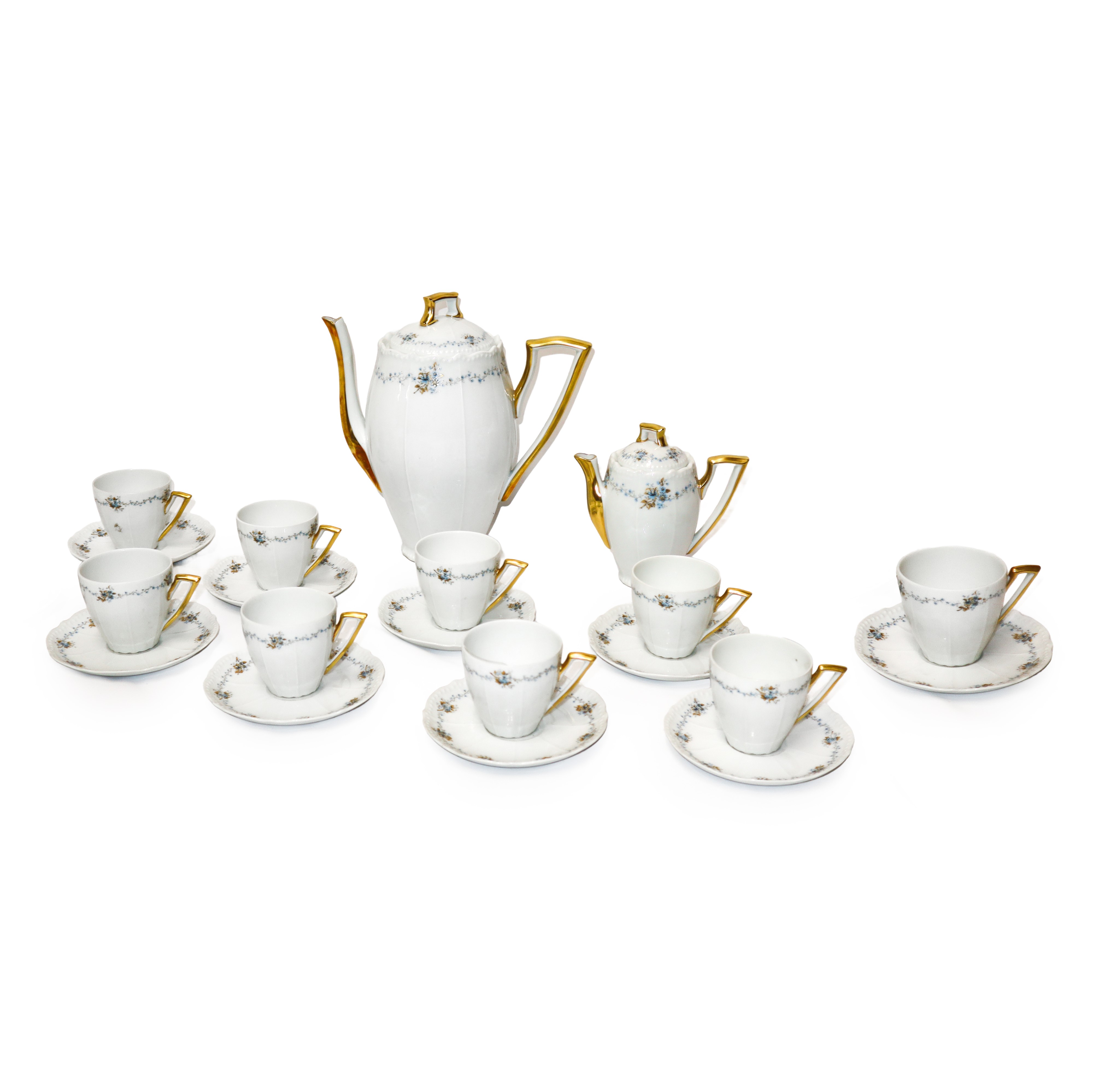 Servizio di piatti e caffè in porcellana Limoges bianco a motivi floreali smaltati in oro