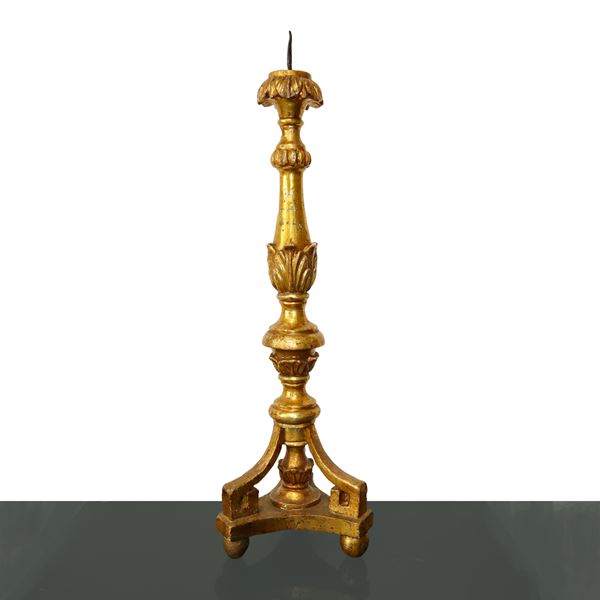 Golden wooden candlestick