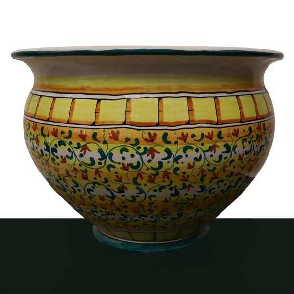 Monteleone Bottega d'arte  Caltagirone - Cachepot in maiolica di Caltagirone dipinta policroma  a fiori e foglie su base gialla