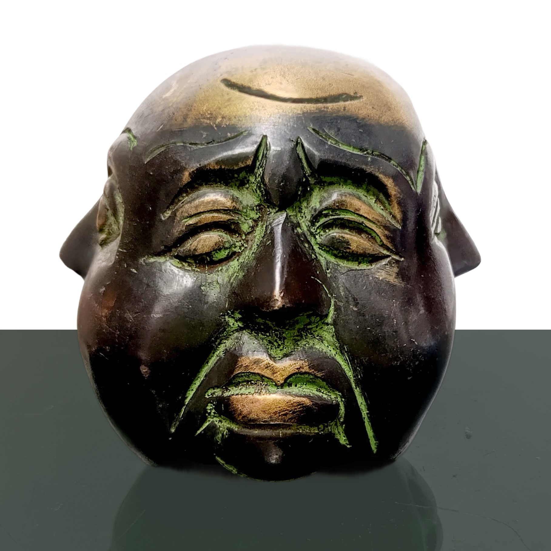 Buddha a 4 facce con la rappresentazione di quattro differenti emozioni