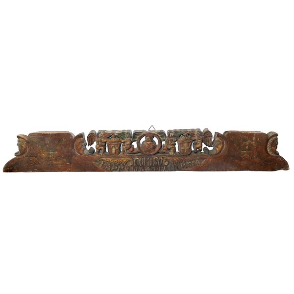 Fragment of a cart carved and carved in walnut wood