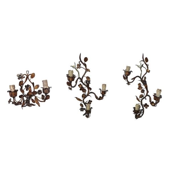 Pair of three-light wall lamps and two-light wall lamps in gold-plated metal