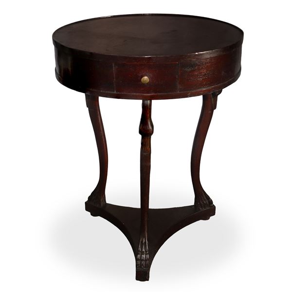 Small round Empire table in mahogany with three zoomorphic feet and drawer