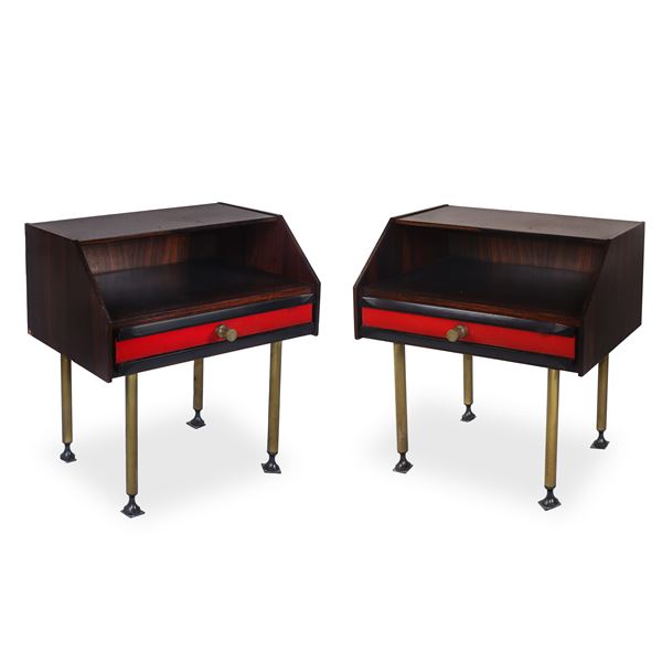 Pair of rosewood bedside tables with red fabric inserts and brass knobs and feet 