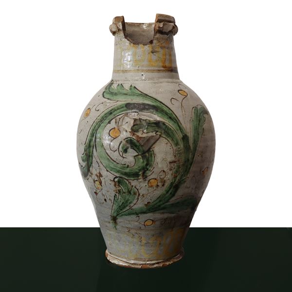 Caltagirone majolica quartara glazed in white paste with acanthus leaf