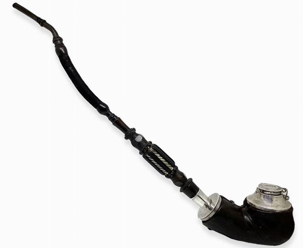 4 - "Bottle" - England. Second half of 1800.
Pipa to large flask with stove and torch foam, horn mouthpiece, link and silver finishes.