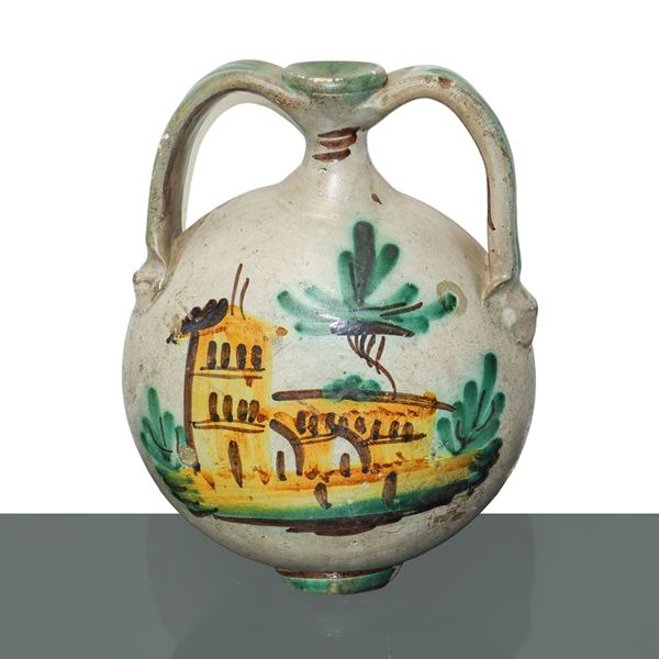 Caltagirone majolica water bottle painted in polychrome with a house on the front
