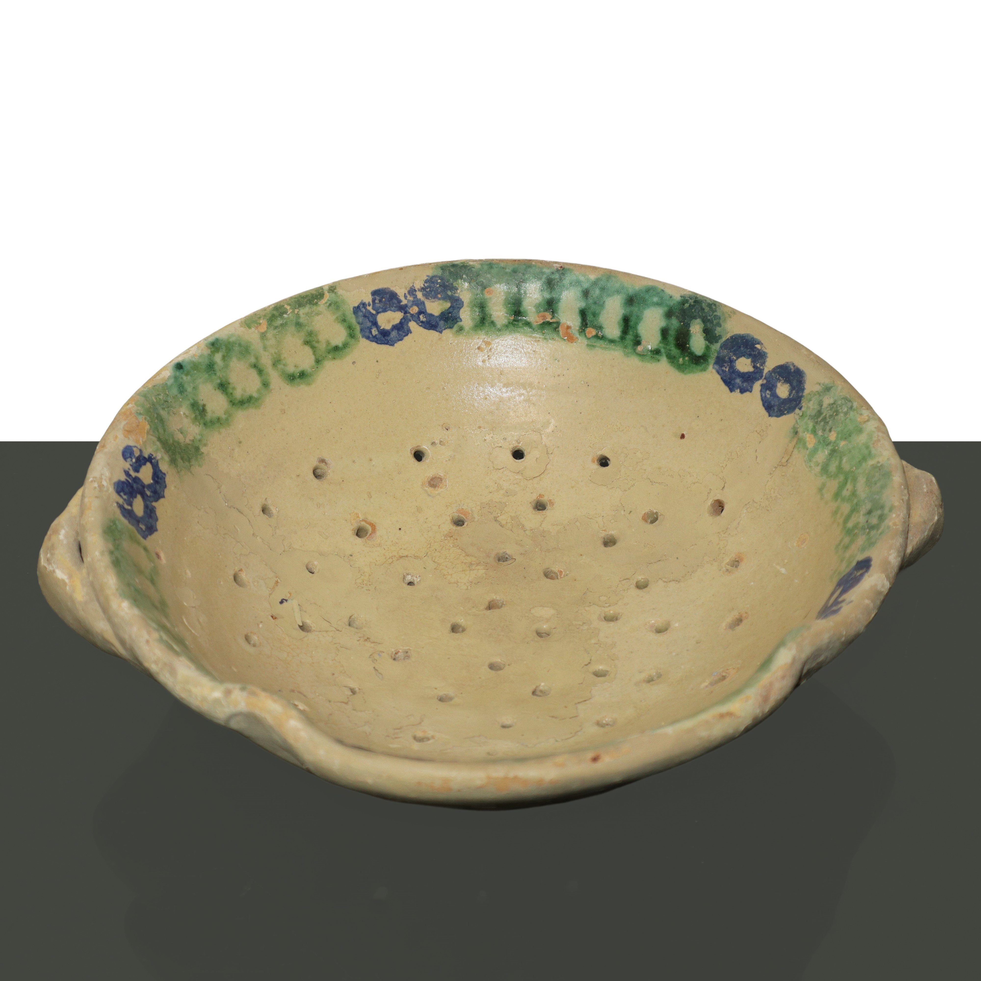 Scolapasta in maiolica policroma di Caltagirone