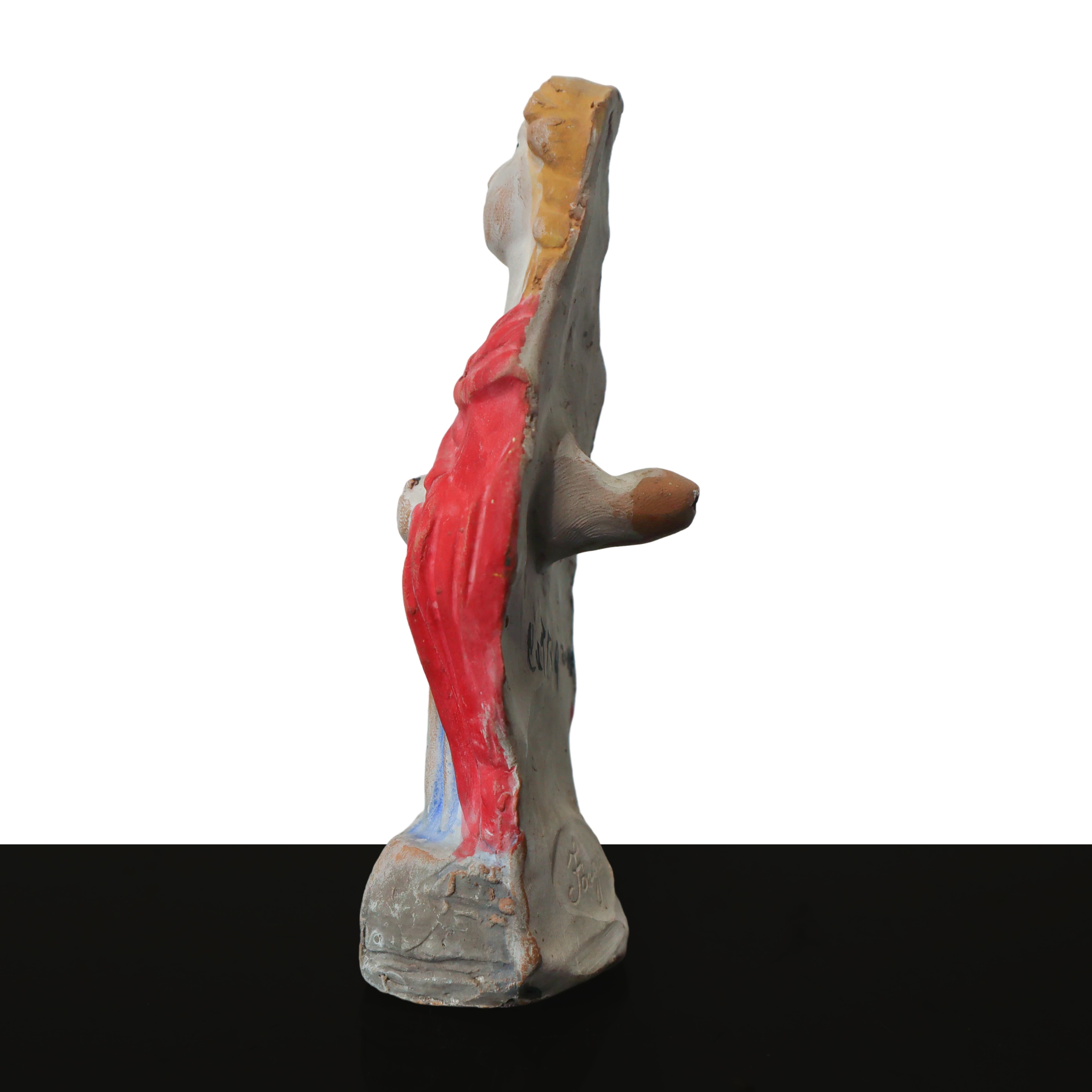 Fischietto in terracotta raffigurante Gesù