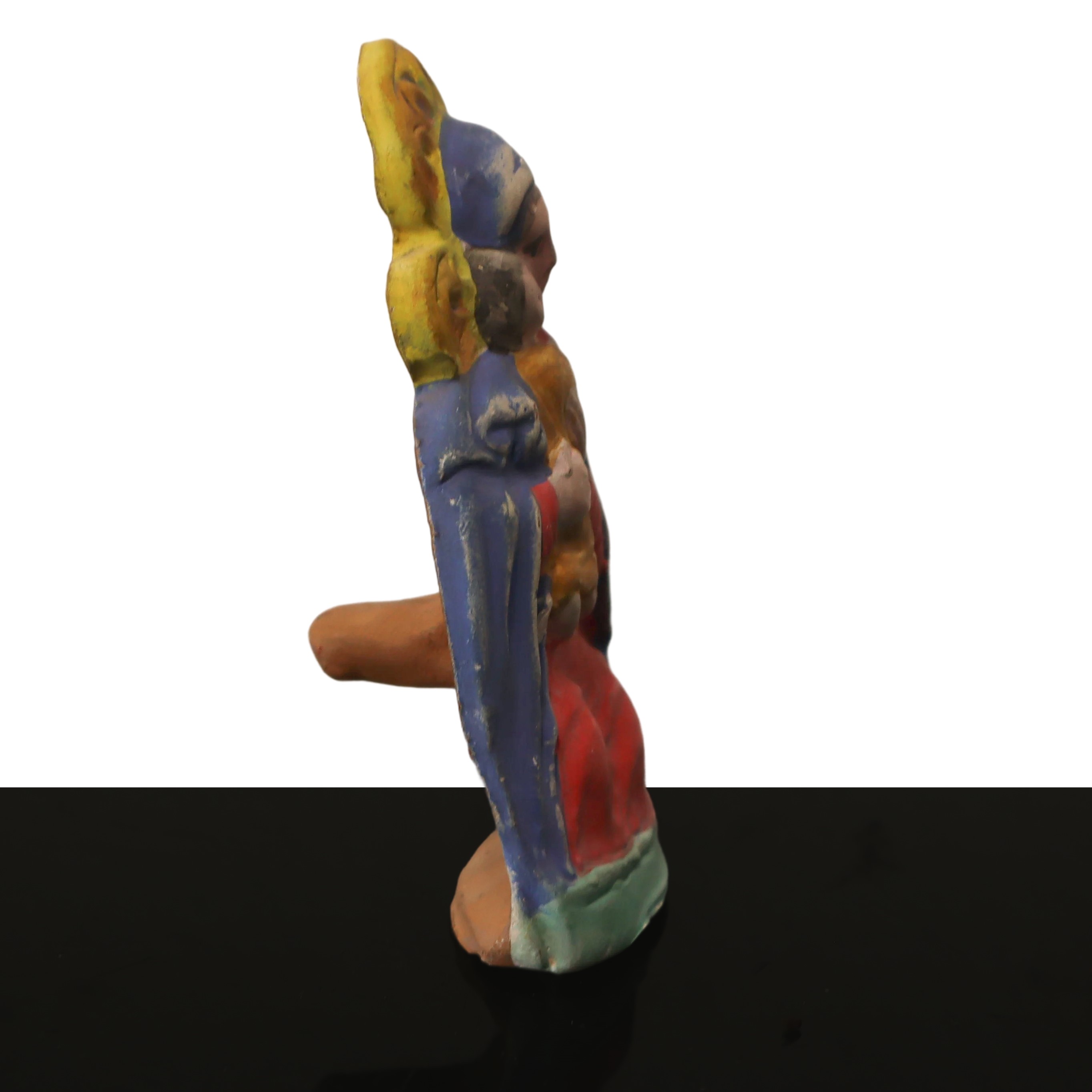 Fischietto in terracotta nella guisa di Madonna e bambino