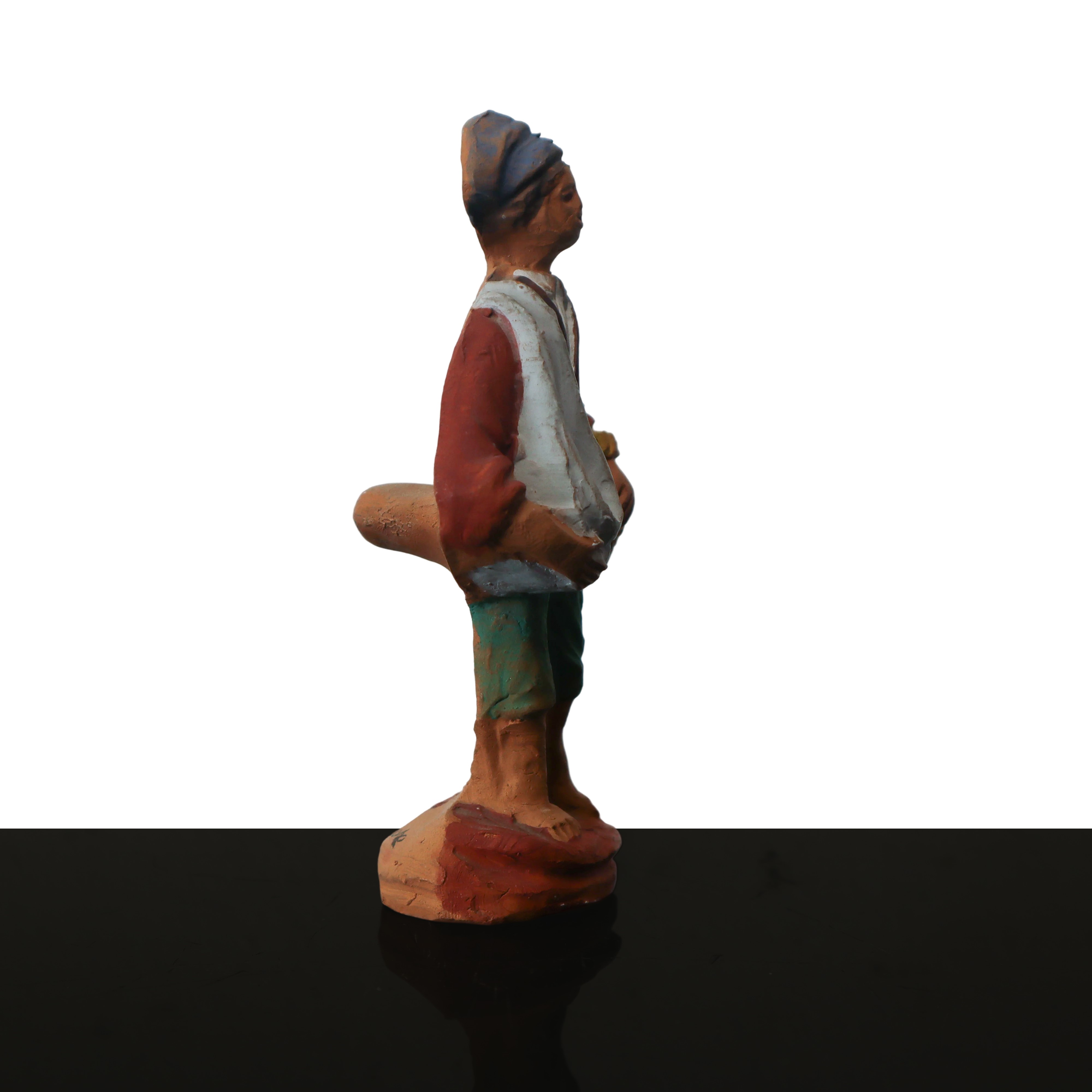 Fischietto raffigurante personaggio popolare