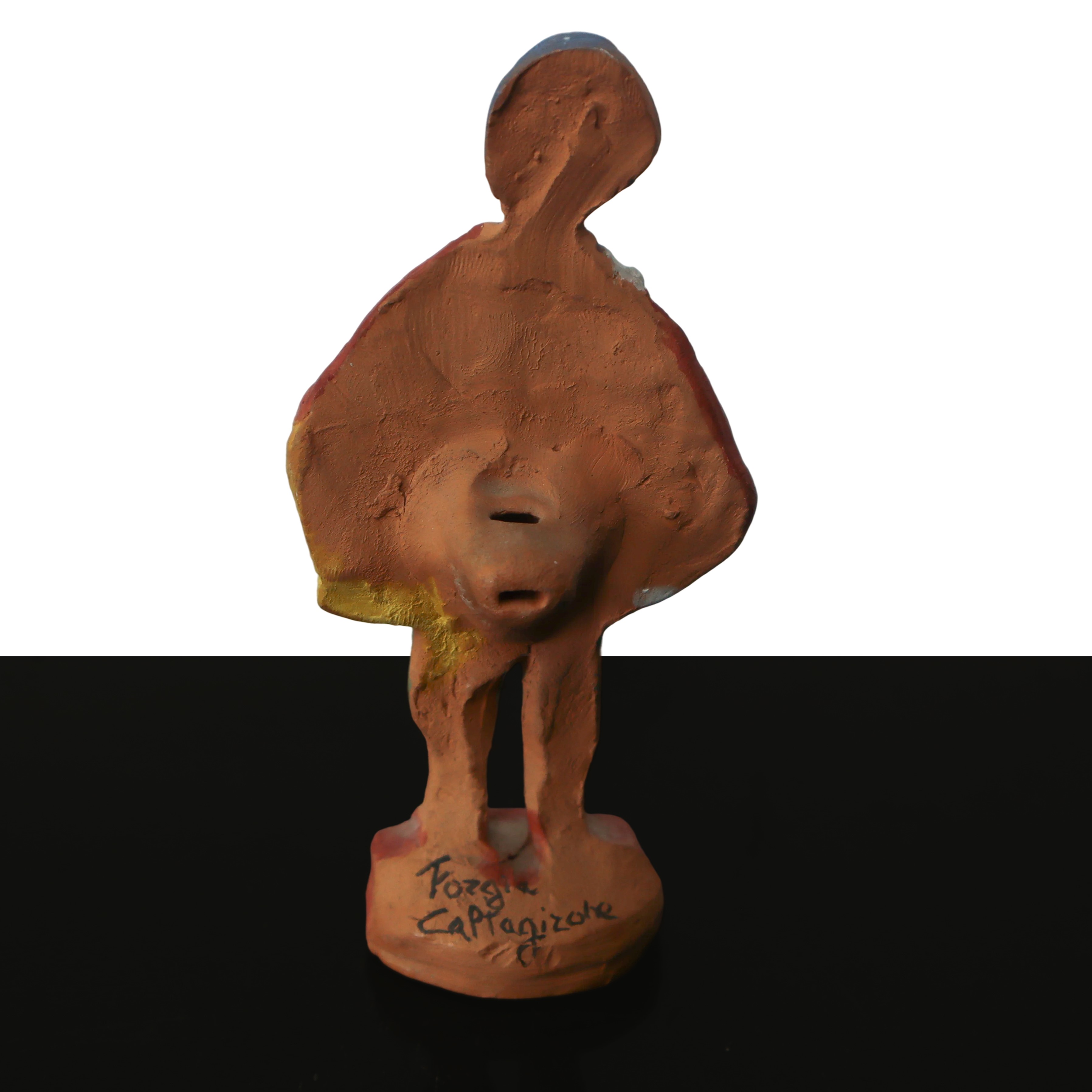 Fischietto raffigurante personaggio popolare