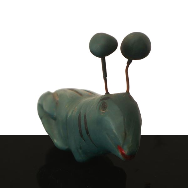 Cricket-shaped whistle