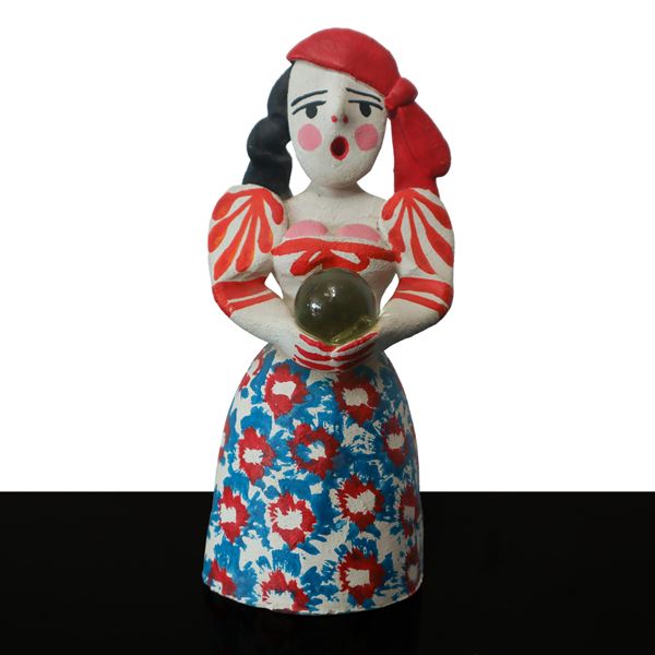 Polychrome whistle depicting a woman