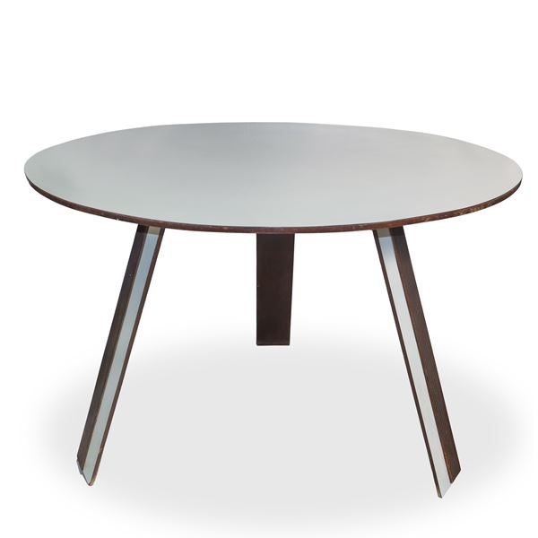 White round table with three-star base