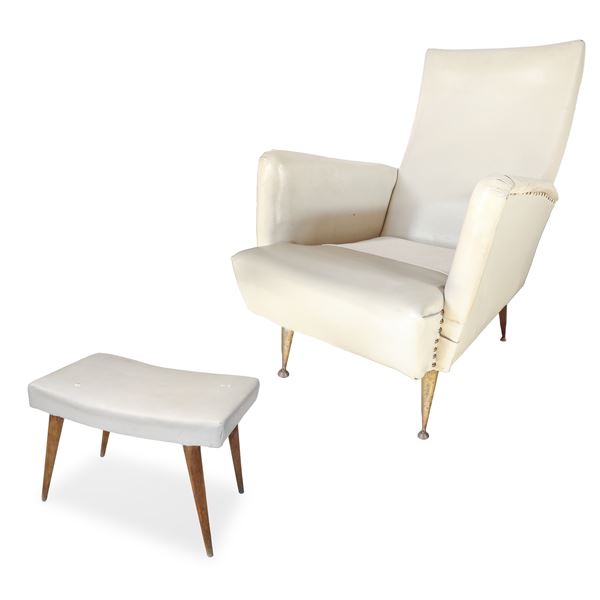 White faux leather armchair with footrest