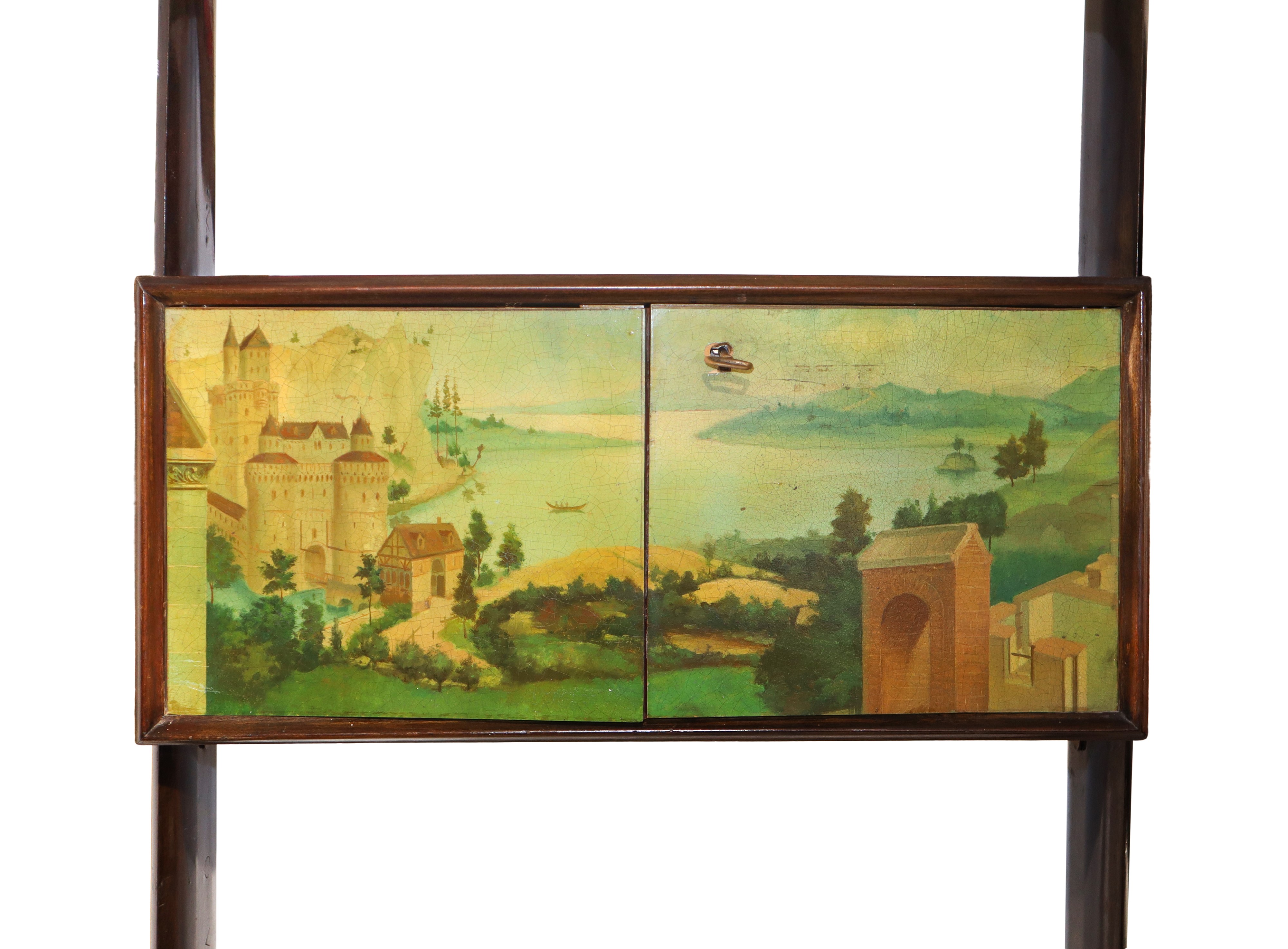 Libreria modulare costituita da due moduli estensibili con pannelli dipinti firmati G. Crestani