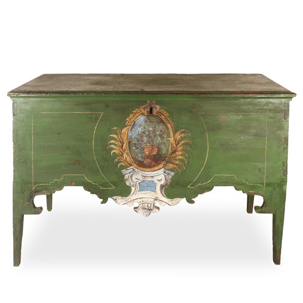 Chest lacquered and painted on the front with a heraldic coat of arms in the center