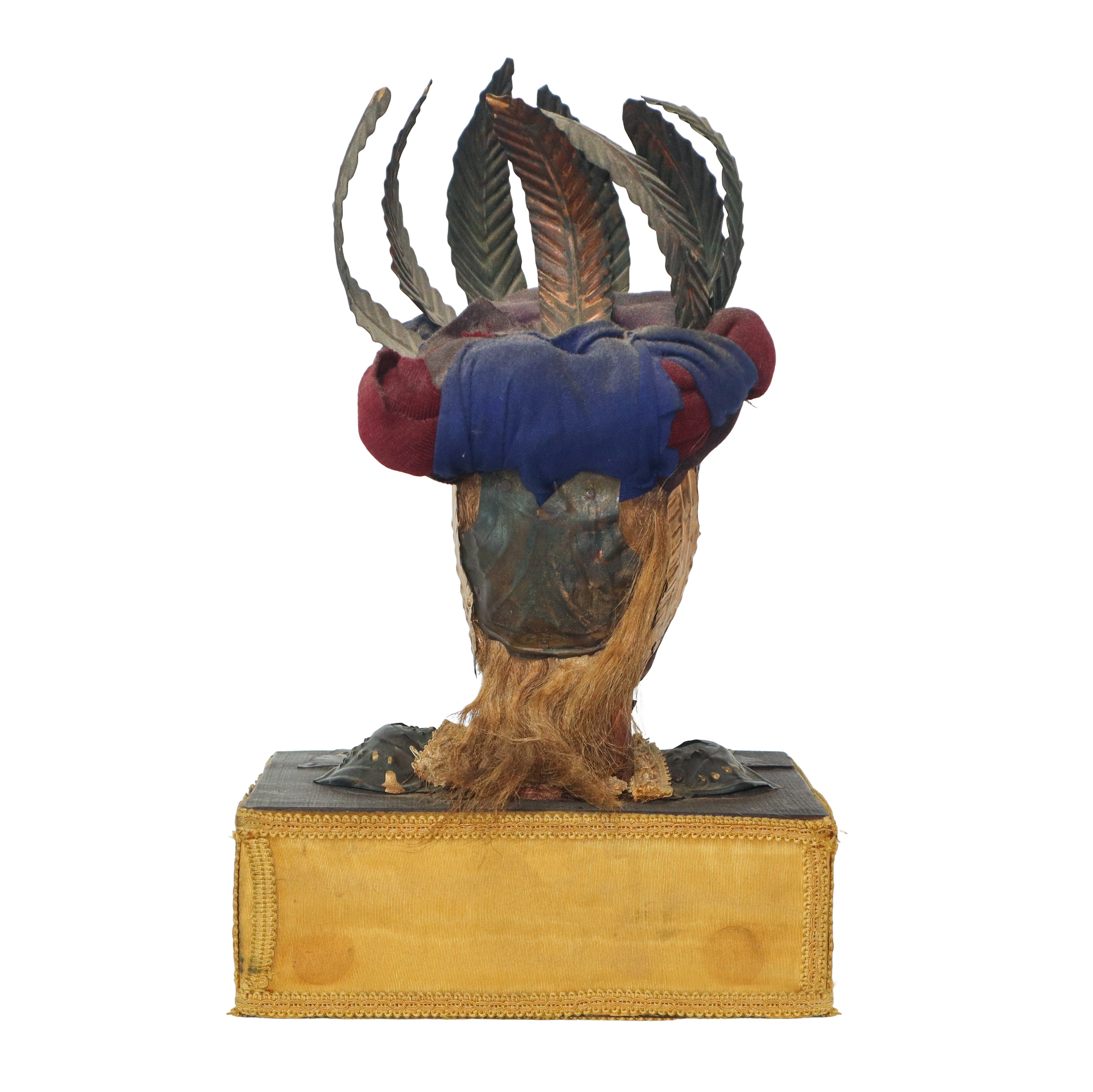 Coppia di teste di pupi siciliani con base