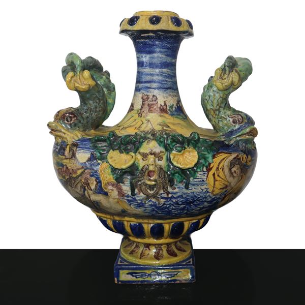 Two-handled vase in polychrome Caltagirone majolica, glazed and enamelled with zoomorphic figures on the sides of the handles and a river deity on the front on both sides