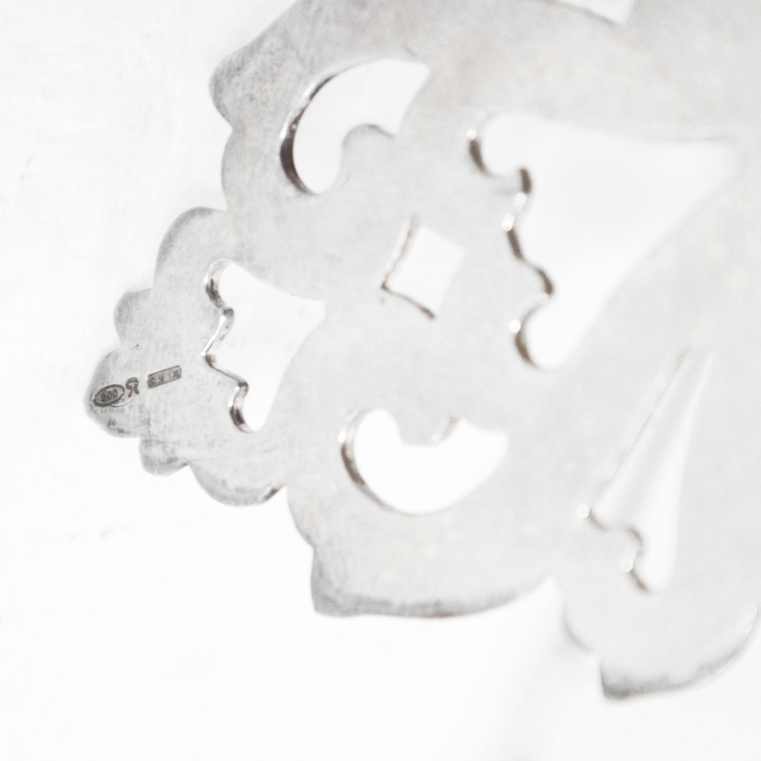 Tastevin in argento 800 con presa decorata