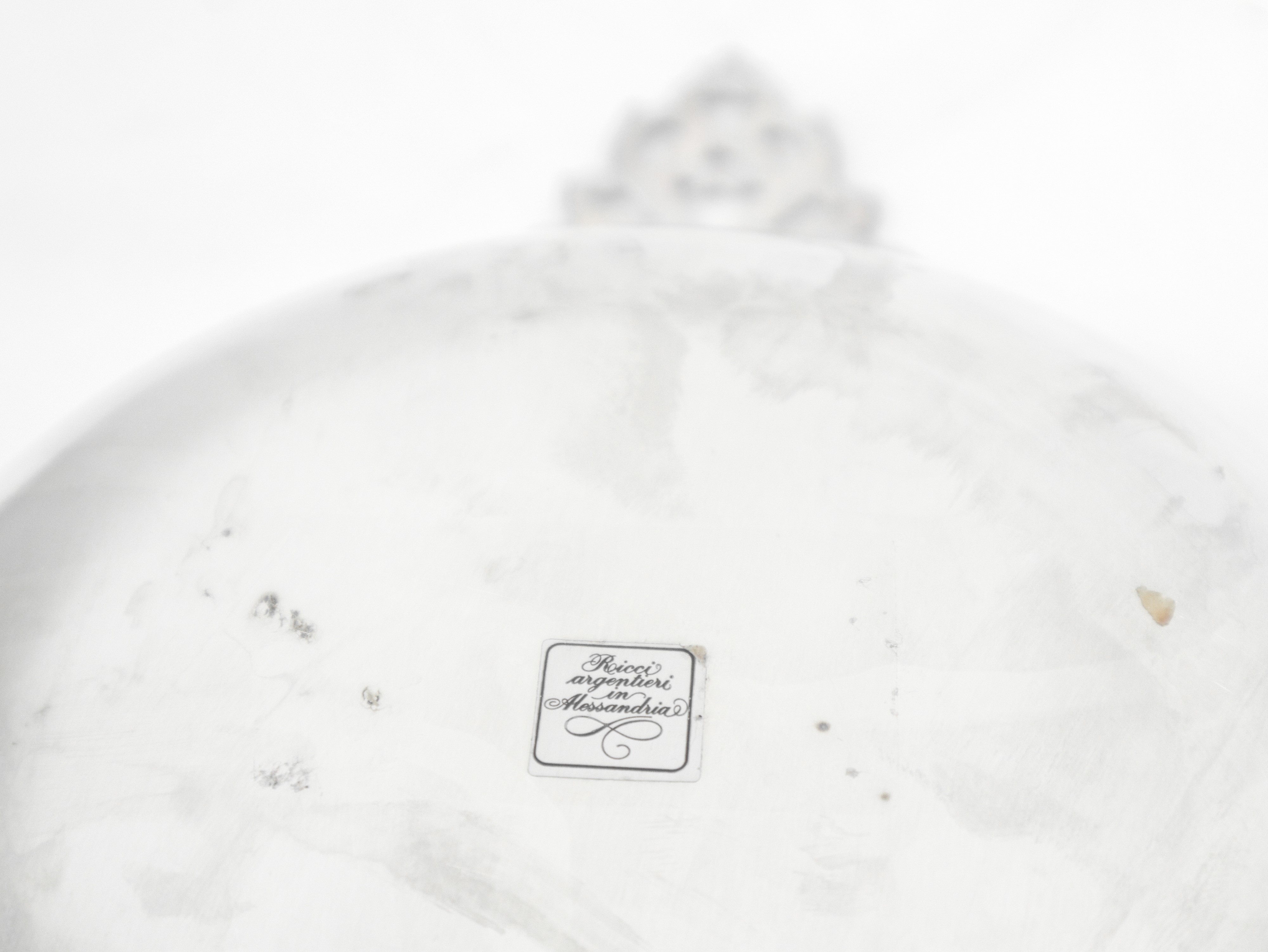 Tastevin in argento 800 con presa decorata