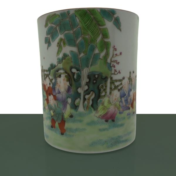 Pen holder depicting children playing