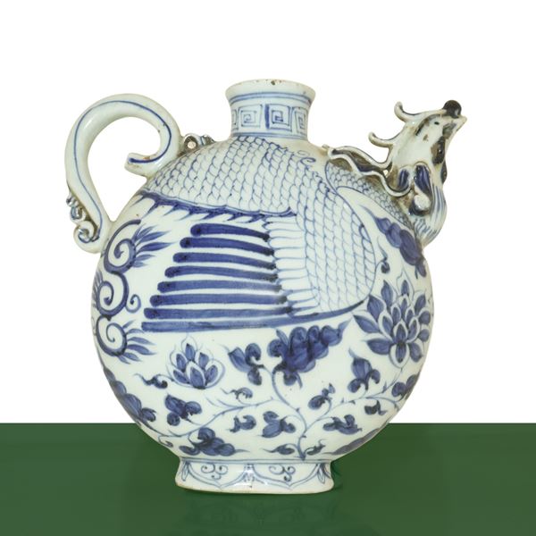 Chinese teapot shaped like a bird decorated in shades of blue and white