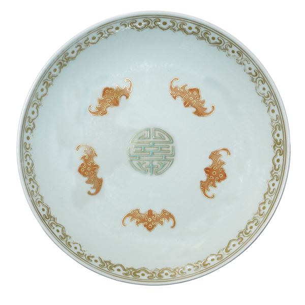 Piatto cinese in porcellana con decoro policromo sul fronte e sul retro decoro floreale