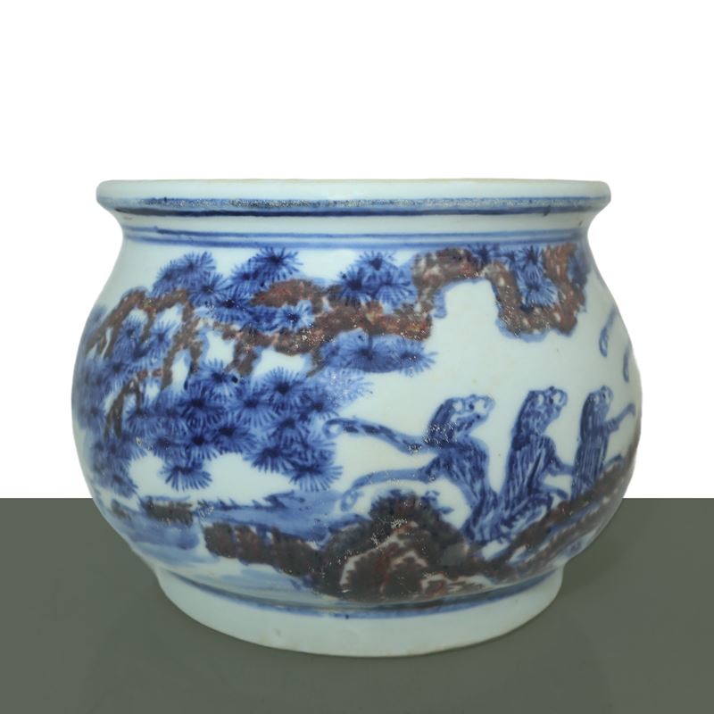 Bruciatore di incenso nei toni blu e bianco con figure