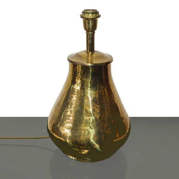 Lamp with golden metal base