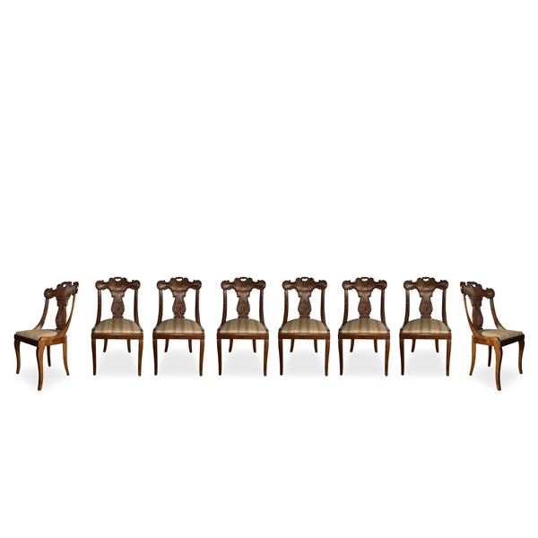 No. 8 Chairs with low relief backrest, sabre feet