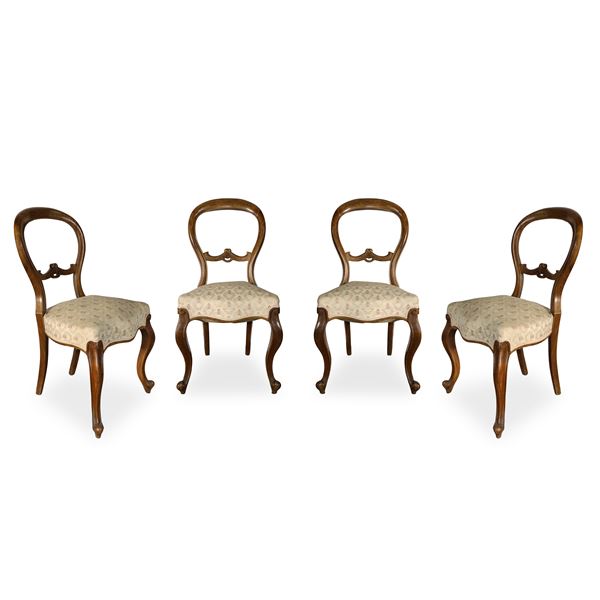 No. 4 Chairs with floral upholstery and rounded backrest