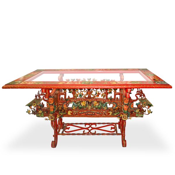 Wooden table with polychrome painted glass top with scenes of paladins and Sicilian tradition.