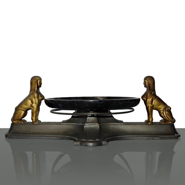 Stand with base and Sphinxes in gilded metal and black marble plate 