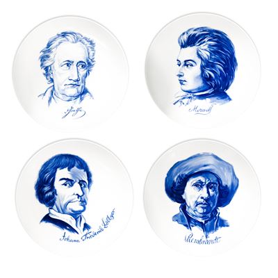 Gruppo di 4 piatti in porcellana con ritratti di personalità illustri, anni '70
