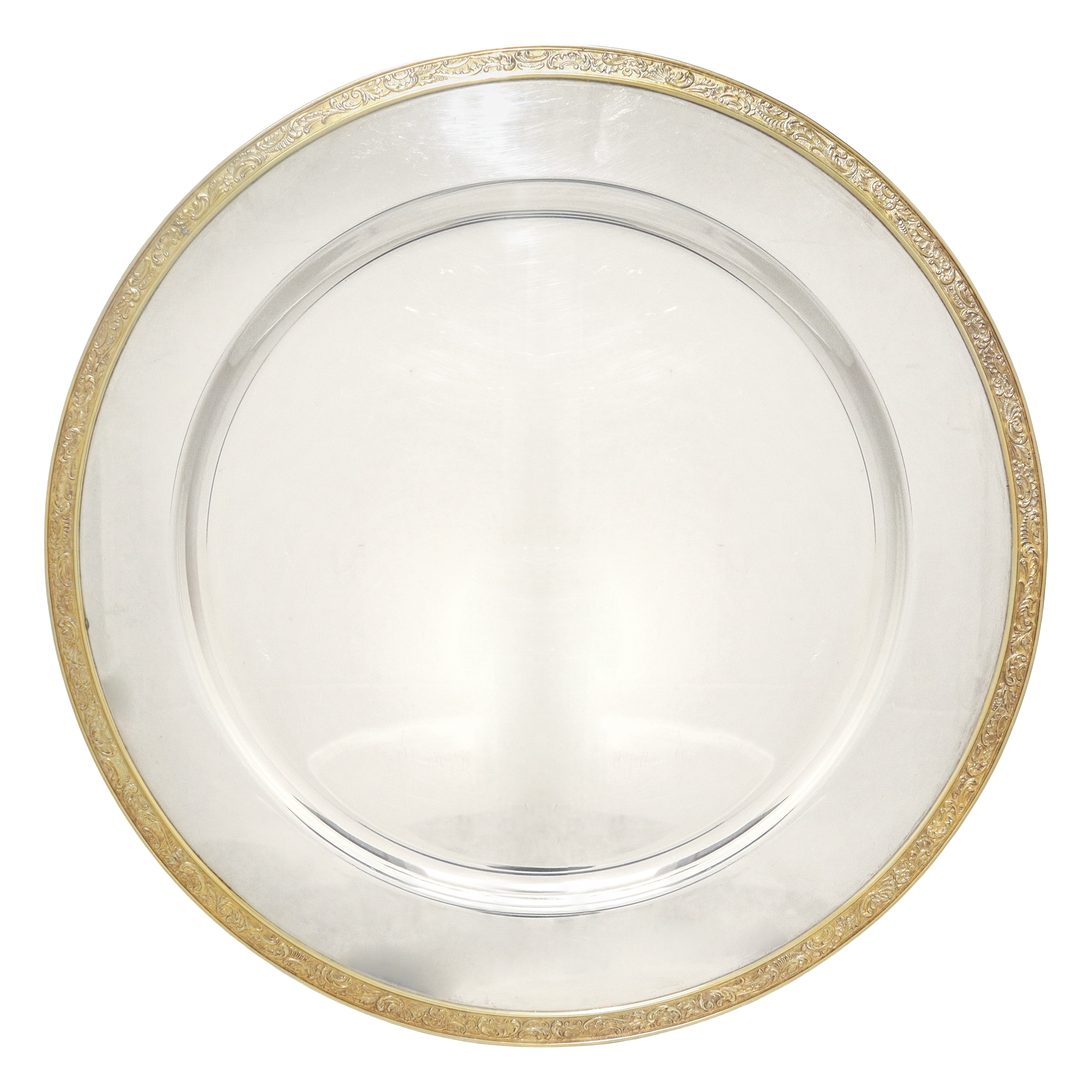 Centrotavola silverplated con bordo dorato e decorato a rilievo composto da piatto e sottopiatto