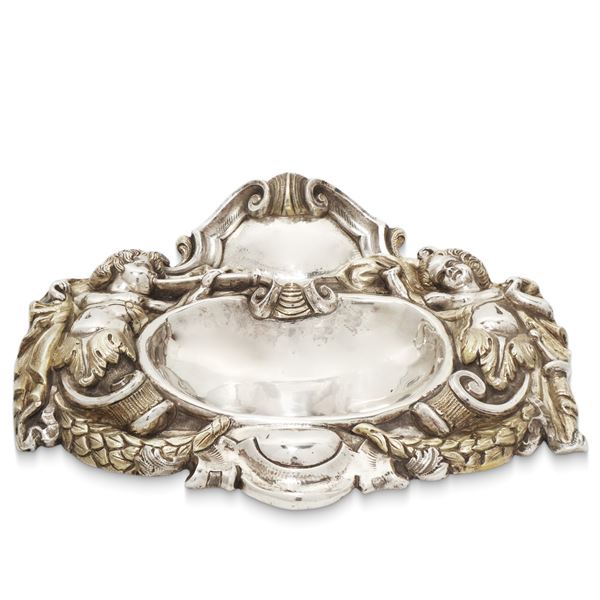 Silver inkwell with musical cherubs on the sides